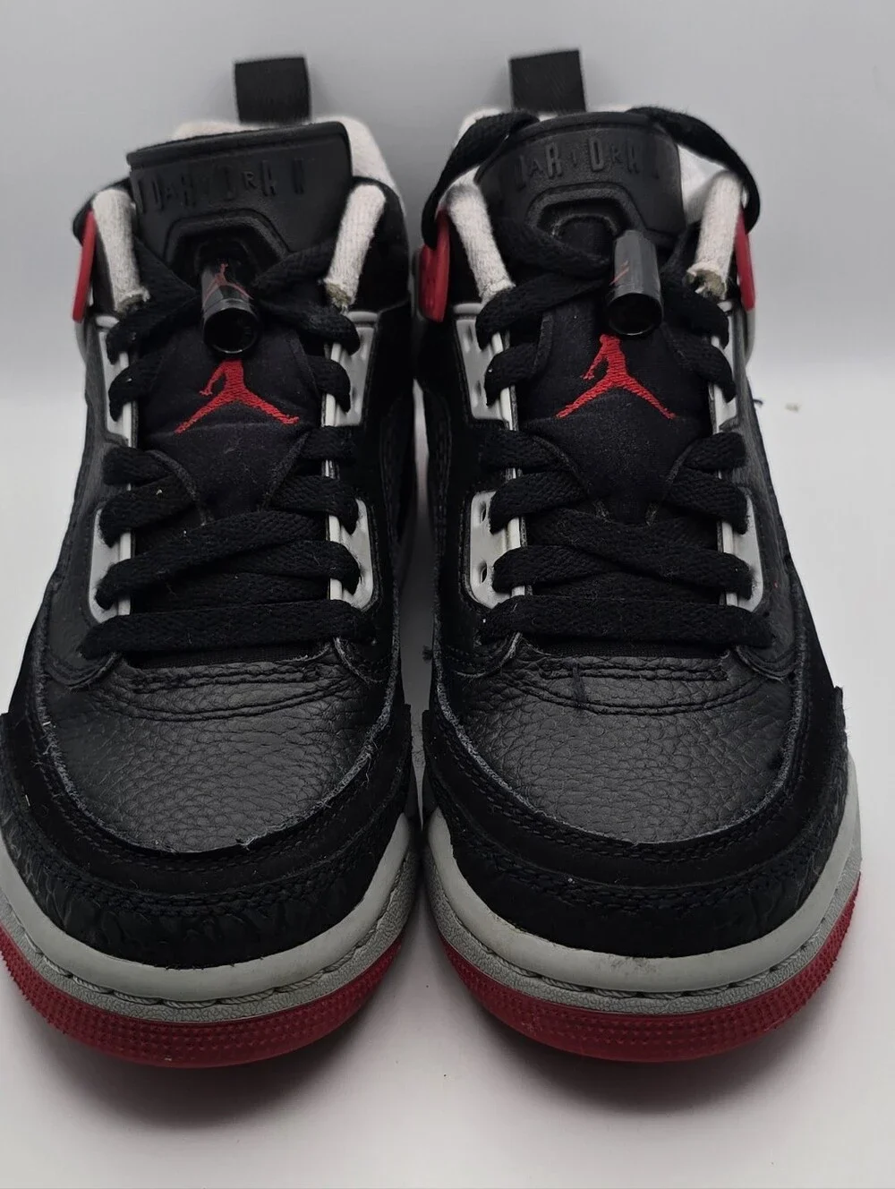 Jordan Kids Black, Red and White Retro Low-Top Sneakers